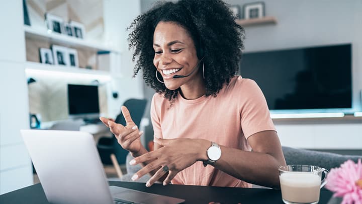 A happy worker on her laptop