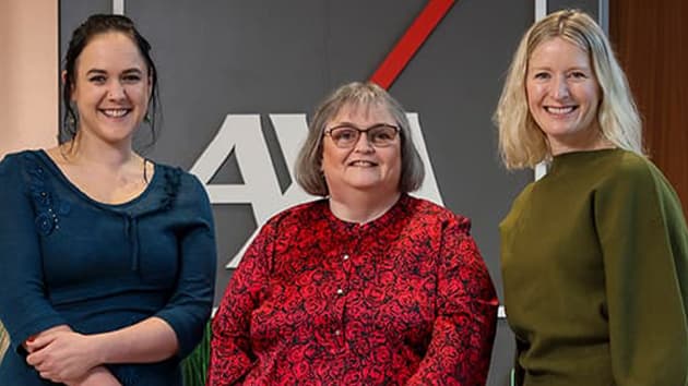 Three business women receiving AXA grant